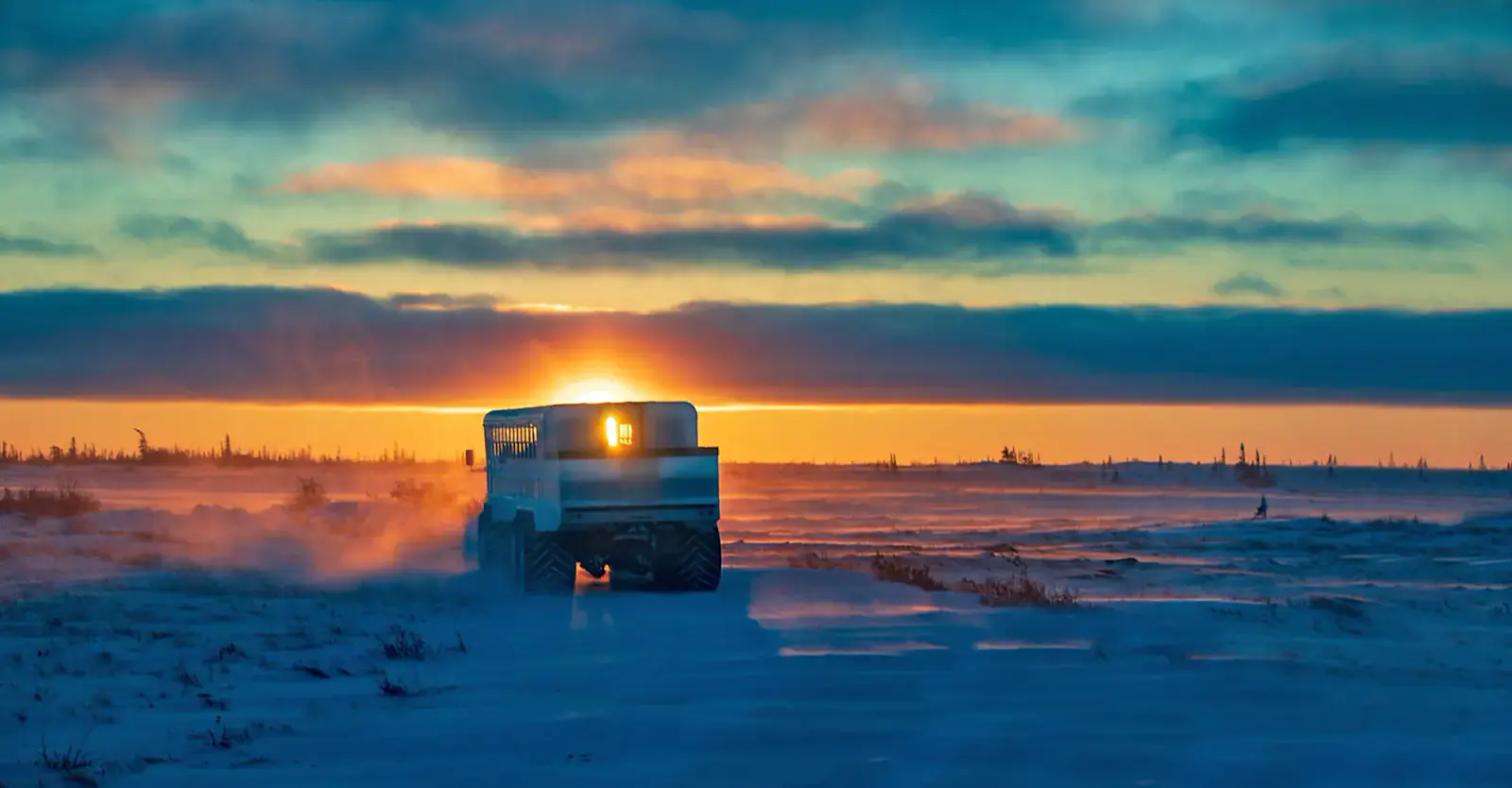 Polar Rover driving into an Arctic sunset, Churchill, Manitoba